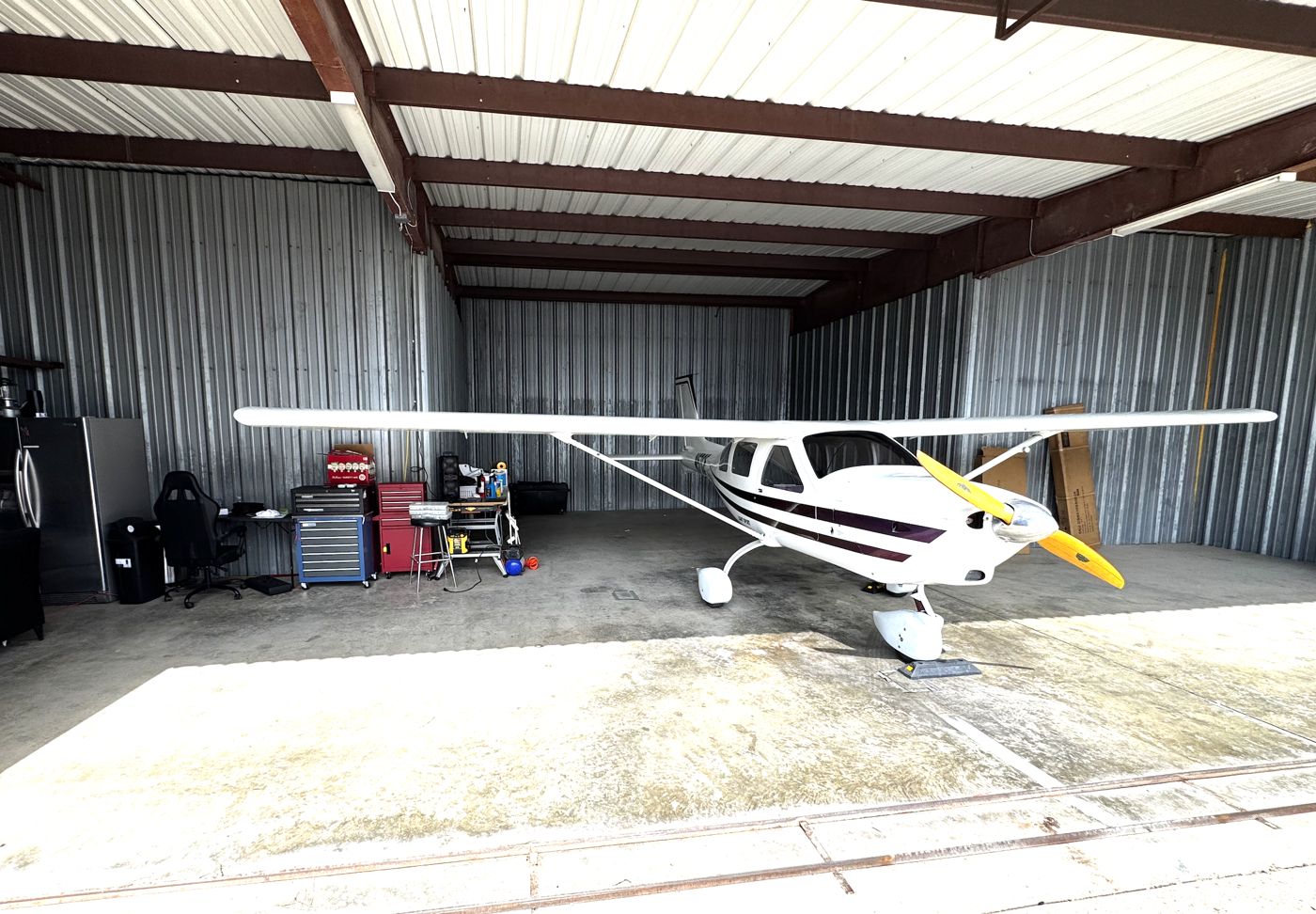 Jabiru J170 parked inside the club hangar